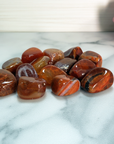 Fire Agate Natural Tumbled Crystal - One Stone - On Tile