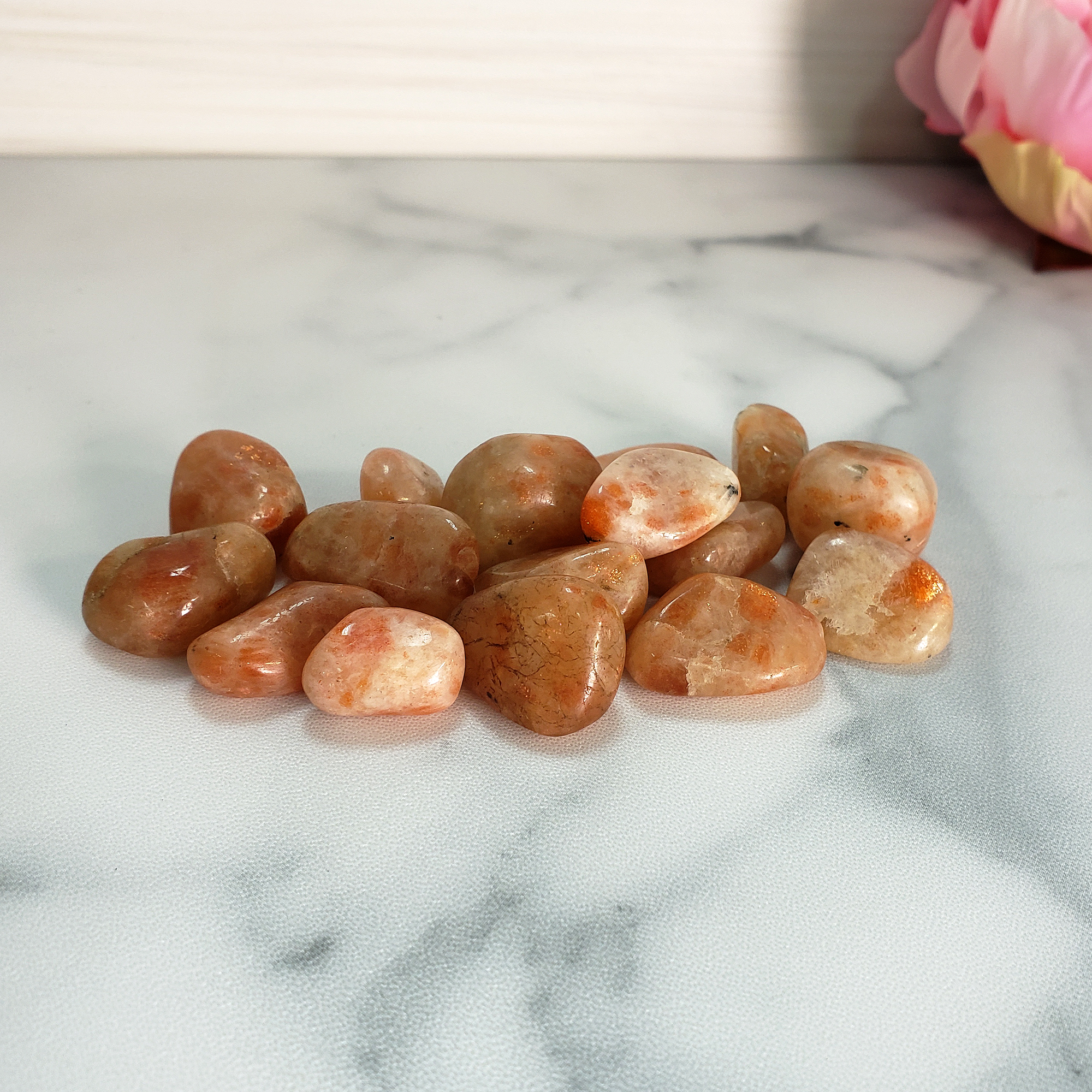 Sunstone Natural Tumbled Stone - Small One Stone - On Tile