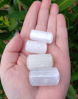 Selenite Crystal Semi-Tumbled Gemstone - One Stone - In Hand In Sunlight 2