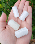 Selenite Crystal Semi-Tumbled Gemstone - One Stone - In Hand in Sunlight
