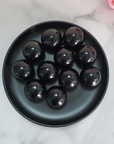 Black Obsidian Natural Crystal Sphere Gemstone Orb Marble - One 30mm Sphere - Obsidian Crystal Orbs in Black Ceramic Bowl