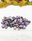 charoite stones on board