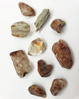 angel phantom quartz stones on white background