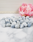Blue Calcite Tumbled Stones on Tile