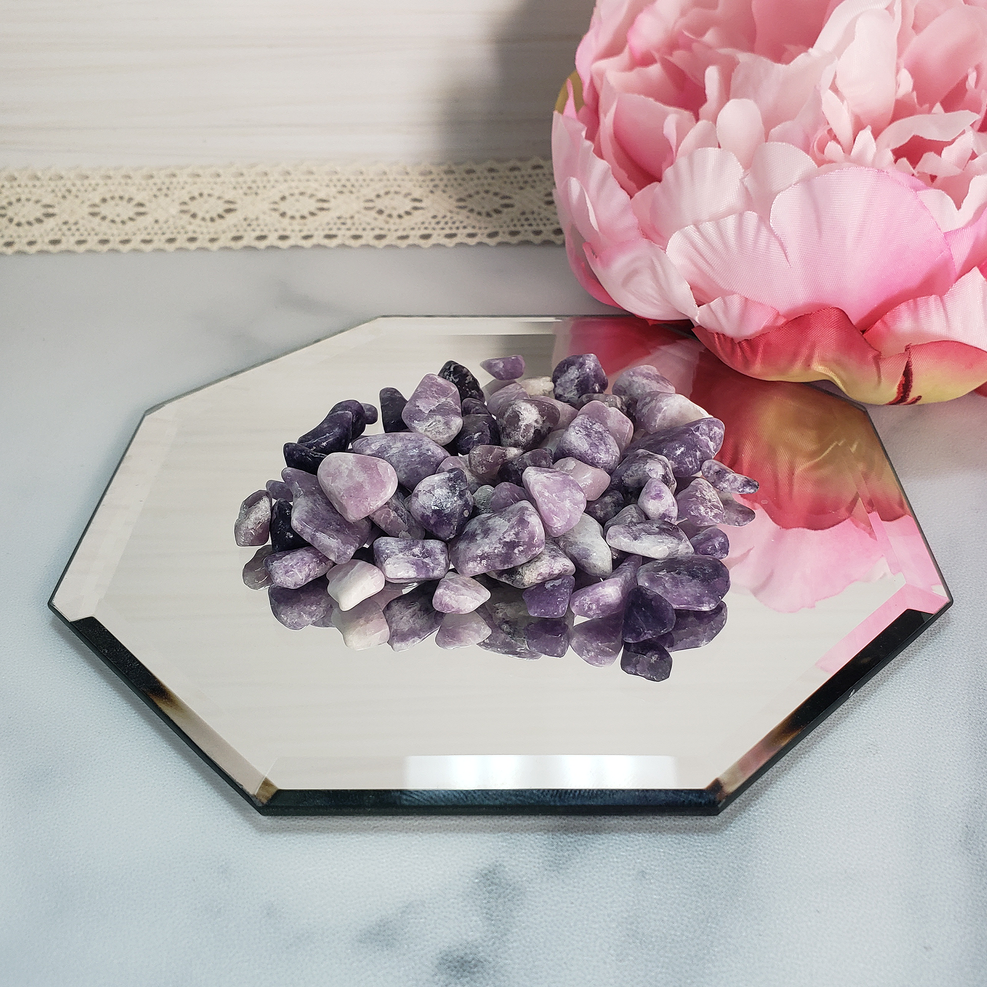 Lepidolite Natural Gemstone Chips By the Ounce - Crystal Chips on Mirror