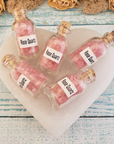 Rose Quartz Crystal Chips Chips in Glass Bottle | Color Enhanced