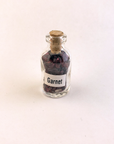 Garnet Natural Crystal Chips Bottle - One Bottle - On White Background