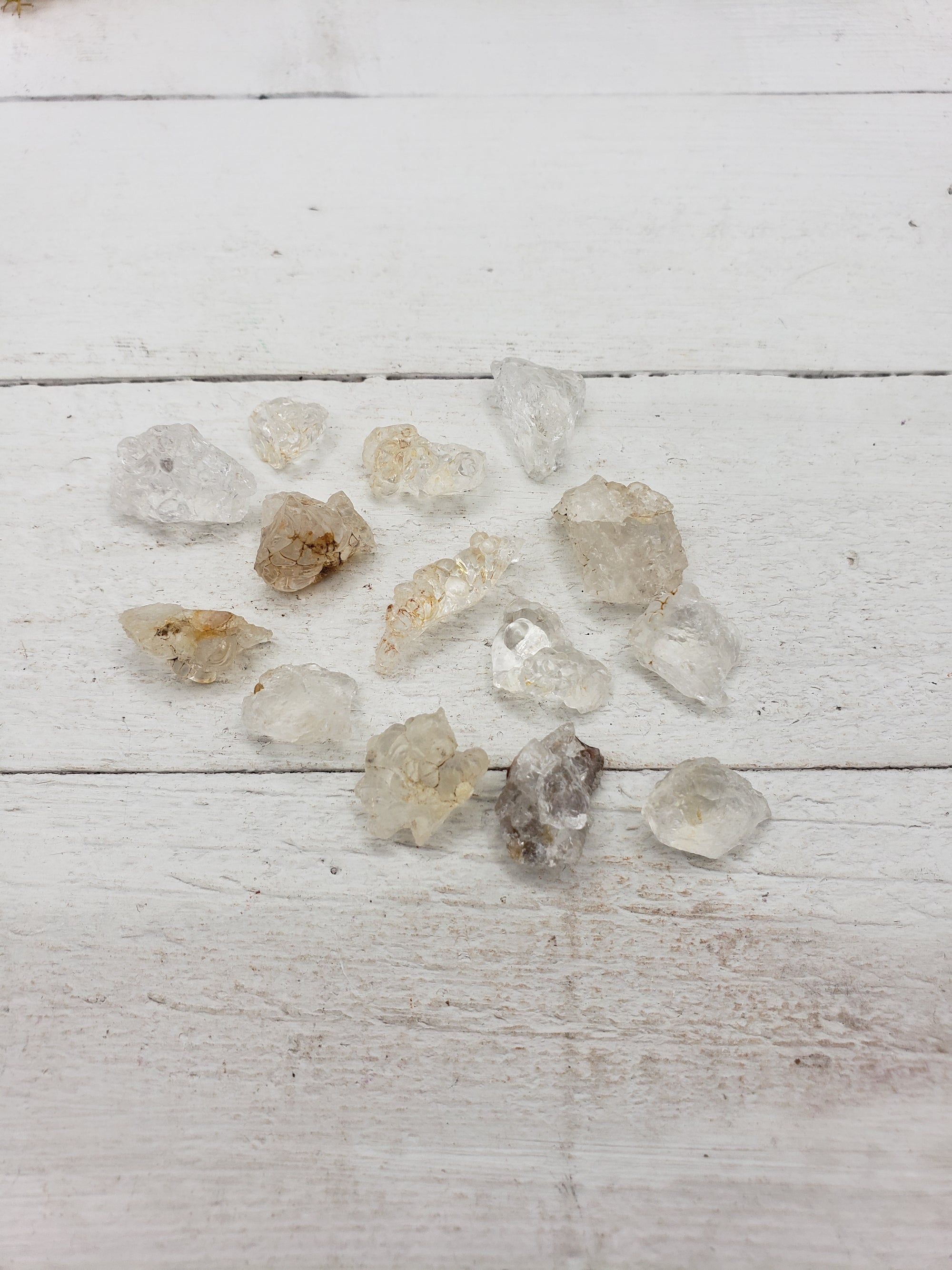 hyalite pieces on white display board