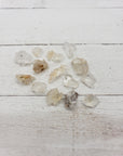 hyalite pieces on white display board