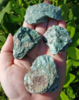 Raw Fuchsite Muscovite Mica Natural Rough Gemstone - Medium One Stone - In Hand Direct Sunlight