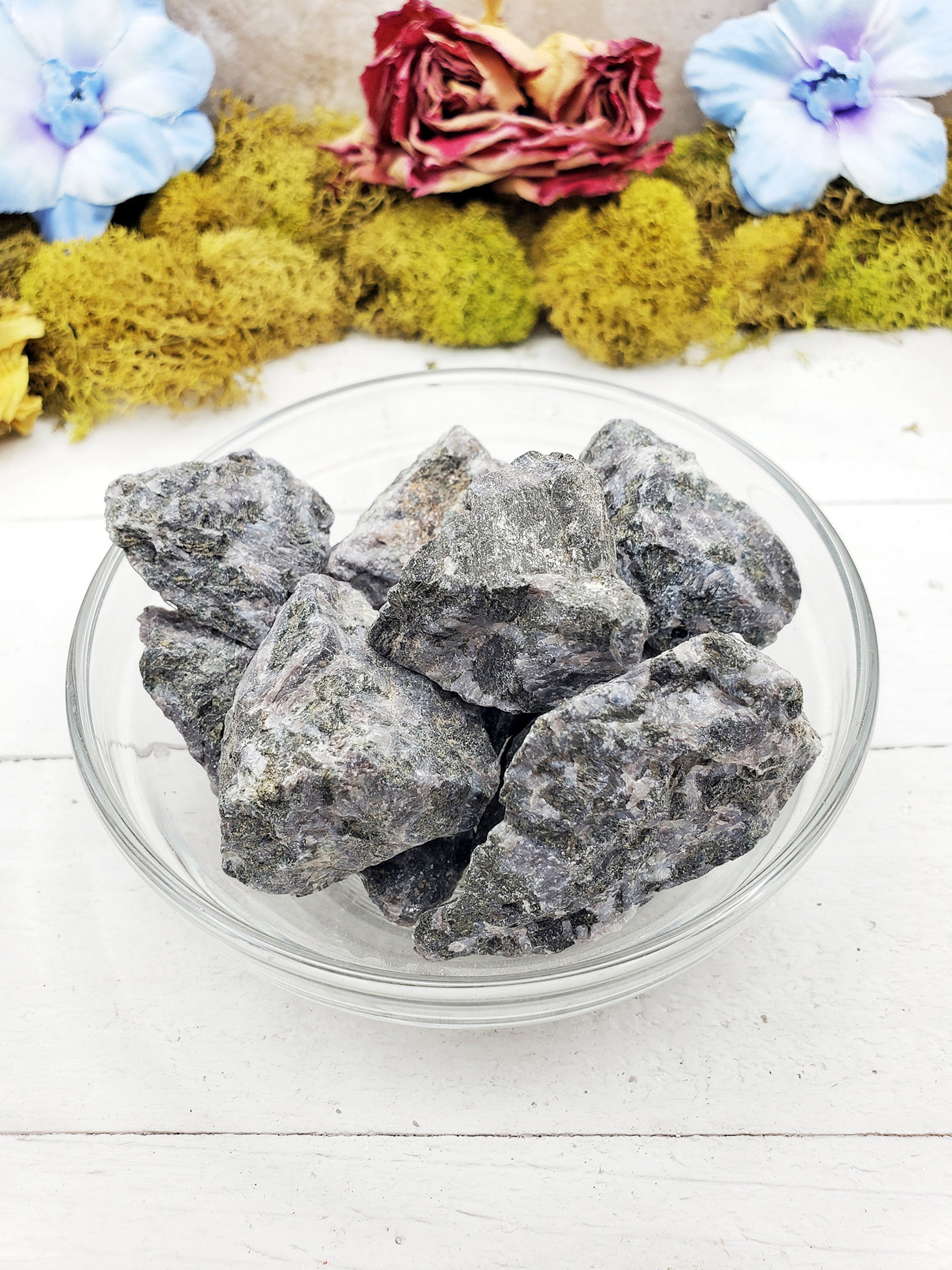 Merlinite Stones in glass bowl