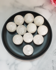 Milky Quartz Natural Gemstone Sphere Crystal Orb Marble - One 30mm Sphere - Milky Quartz Crystal Balls on Black Ceramic Plate