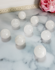 Milky Quartz Natural Gemstone Sphere Crystal Orb Marble - One 30mm Sphere - 9 Milky Quartz Crystal Spheres Viewed from Top Angle