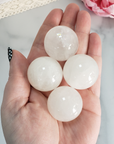 Milky Quartz Natural Gemstone Sphere Crystal Orb Marble - One 30mm Sphere - Four Milky Quartz Crystal Balls in Hand