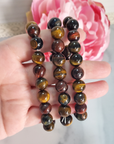 Multi Tigers Eye Crystal Natural Gemstone 10mm Bead Bracelet - On Fingers