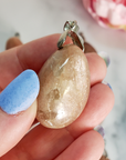 Peach Moonstone Crystal Pendant Natural Gemstone Jewelry - Close Up of Strong Flash and Inclusions