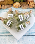 Peridot Natural Crystal Chips Bottle - One Bottle in Selenite Bowl