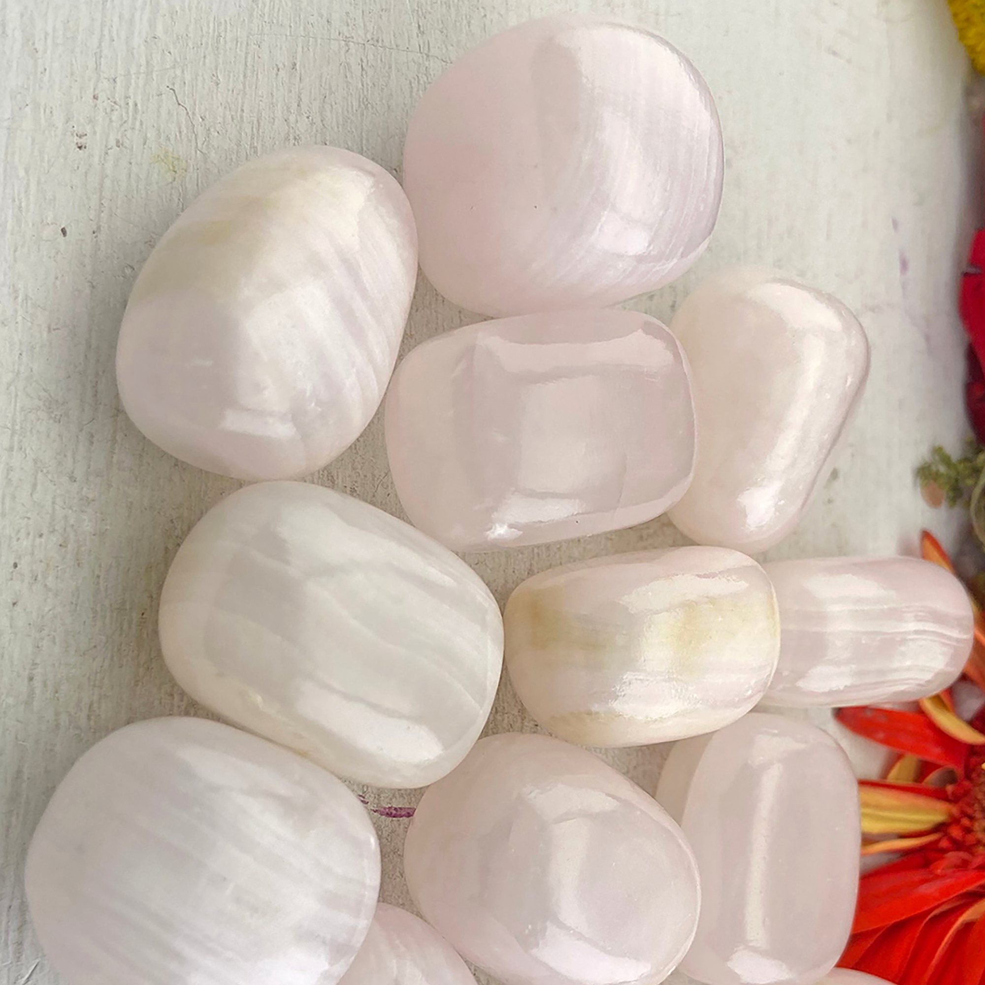 Pearl Pink Calcite Crystal Natural Tumbled Stone - Close Up of Heart Chakra Stones