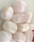 Pearl Pink Calcite Crystal Natural Tumbled Stone - Close Up of Heart Chakra Stones