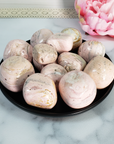 Pink Rhodochrosite Crystal Natural Gemstone Tumbled Stone | Multiple Sizes - in Black Ceramic Bowl