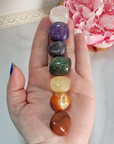 Rainbow Seven Chakra Tumbled Crystals Set with Pouch - In Hand