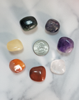 Rainbow Seven Chakra Tumbled Crystals Set with Pouch - Size Comparison