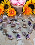 MINI Druzy Raw Amethyst Crystal Clusters - 3 Ounce Bag - On tile