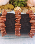 Red Goldstone Manmade Gemstone Nugget Stretch Bracelet - On Display