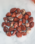 Red Jasper Stone Natural Gemstone Tumbled Crystal - On Tile
