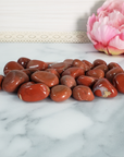 Red Jasper Stone Natural Gemstone Tumbled Crystal - Grouped on Tile