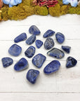 tumbled sodalite on display board