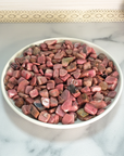 Rhodonite Crystal Pebbles Natural Gemstone Chips By the Ounce - Rhodonite Stone Chips in White Ceramic Bowl