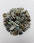 One ounce of labradorite crystal chips on white background