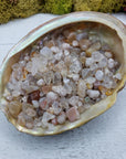 three ounces of cherry blossom agate chips in abalone shell