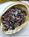 Three ounces of mixed multi tourmaline crystal chips in abalone shell