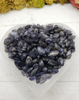 Six ounces of iolite crystal chips in selenite bowl
