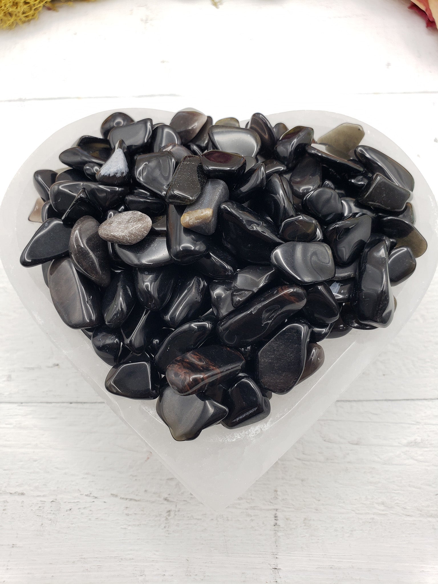 Six ounces of Obsidian crystal chips in selenite bowl