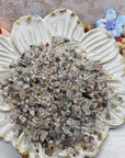 Seven ounces of mixed agate crystal chips on floral dish display