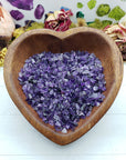 eight ounces of amethyst chips in wooden bowl