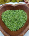eight ounces of peridot stone chips in bowl