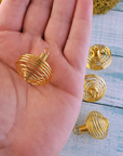 Gold-Colored Metal Spiral Cage Ornament Pendant - Perfect for Holding Gemstones or Orbs! - In Hand