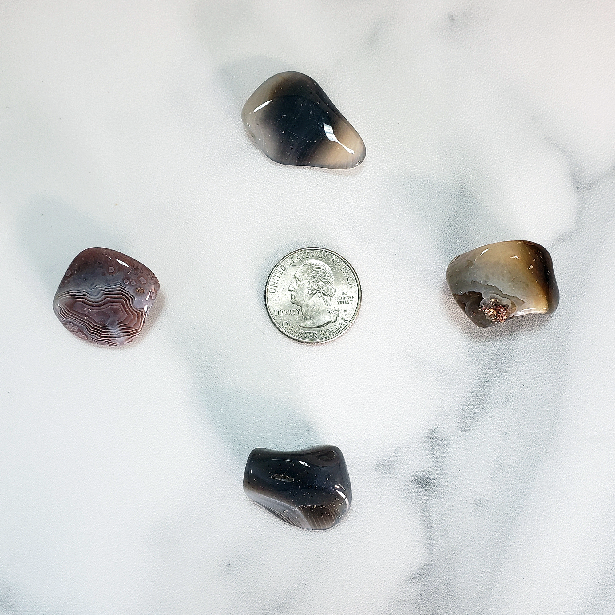 Botswana Agate Tumbled Gemstone - Single Stone - Size Comparison