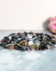 Botswana Agate Tumbled Gemstone - Single Stone - Group on Tile