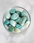 Peruvian Turquoise Natural Tumbled Stone - One Stone - Glass Bowl from Above