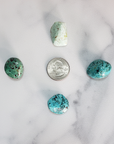 Peruvian Turquoise Natural Tumbled Stone - One Stone - Size Comparison