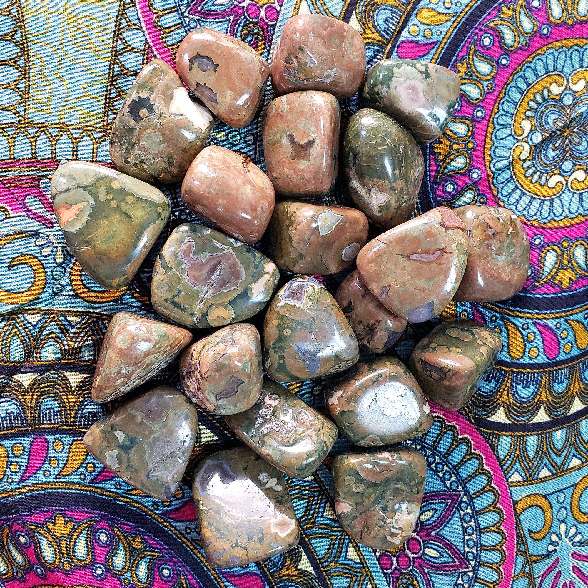 Rhyolite Natural Gemstones - Tumbled Stones on Patterned Cloth