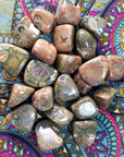 Rhyolite Natural Gemstones - Tumbled Stones on Patterned Cloth