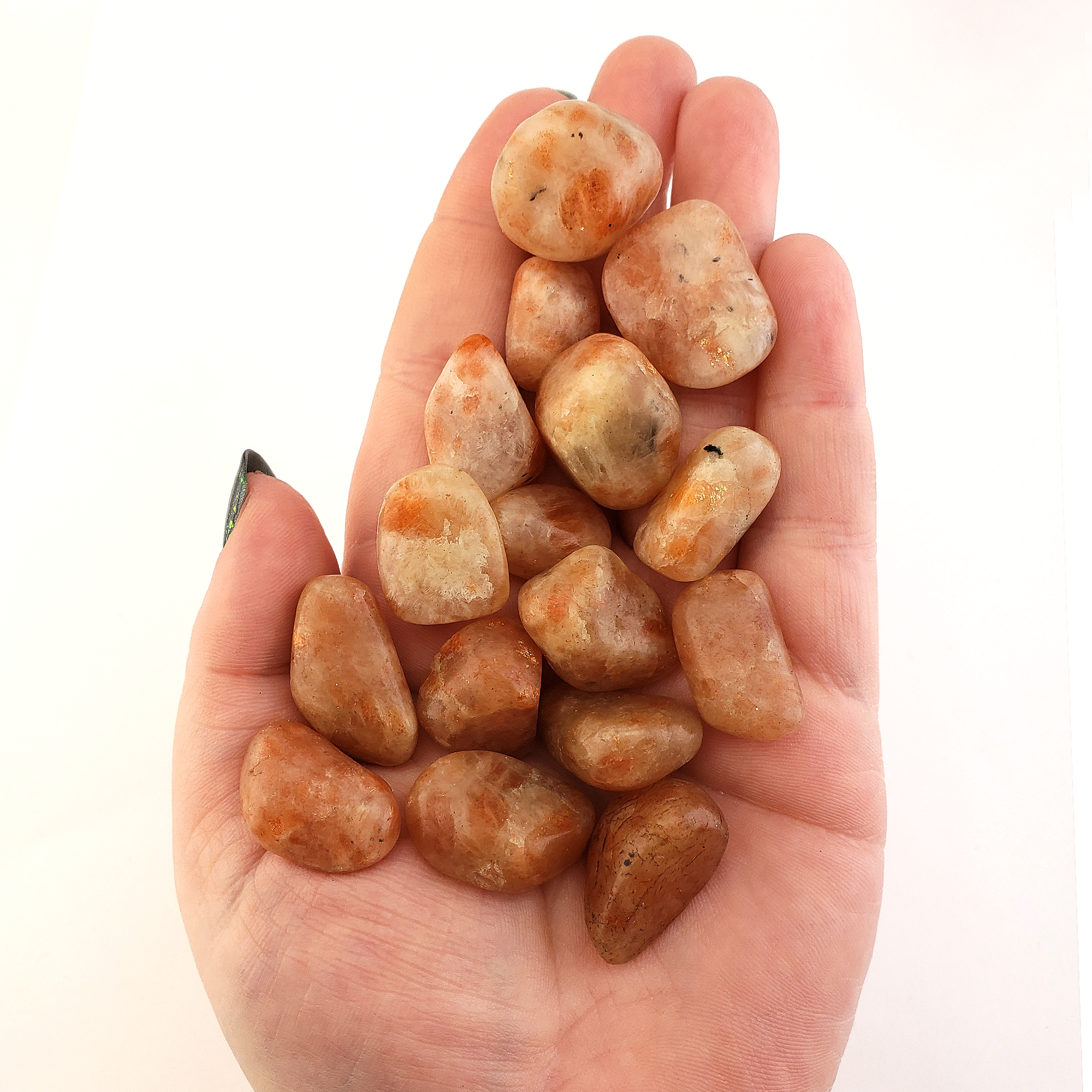 Sunstone Natural Tumbled Stone - Small One Stone - In Hand White Background 3