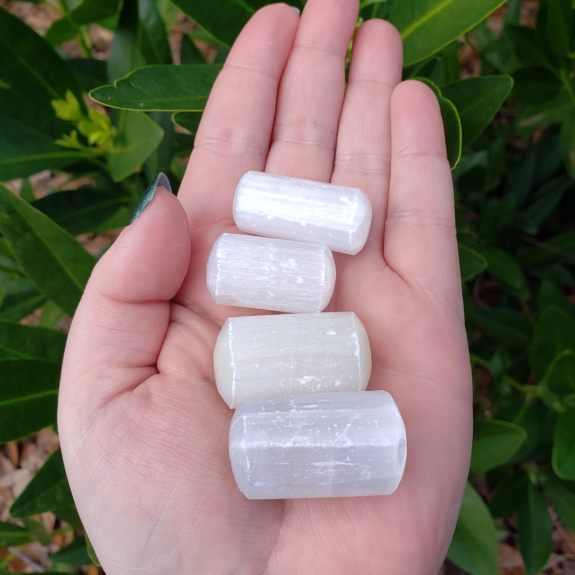 Selenite Crystal Semi-Tumbled Gemstone - One Stone - In Hand In Sunlight 2