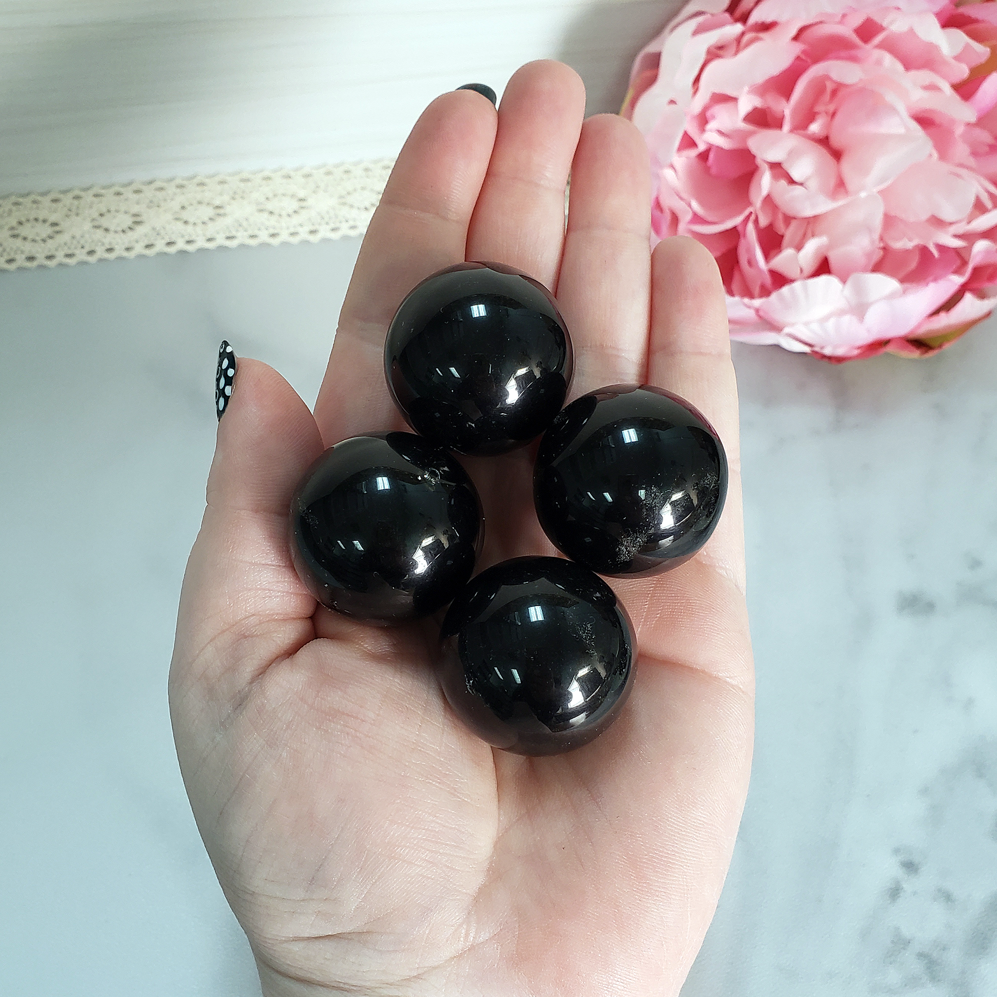 Black Obsidian Natural Crystal Sphere Gemstone Orb Marble - One 30mm Sphere - Group of Black Obsidian Orbs in Hand